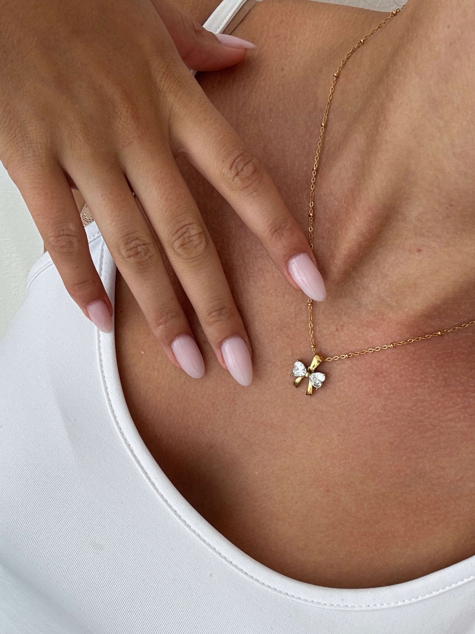 Amara Zirconia Bow Pendant Necklace