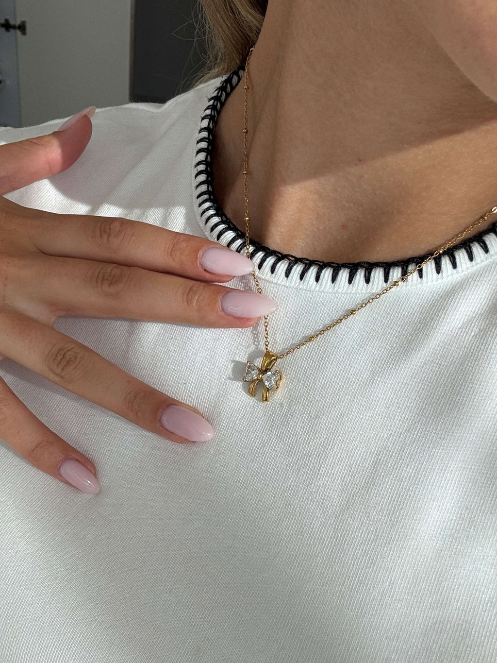 Amara Zirconia Bow Pendant Necklace