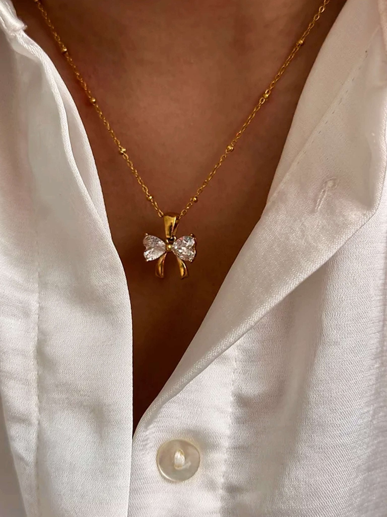 Amara Zirconia Bow Pendant Necklace